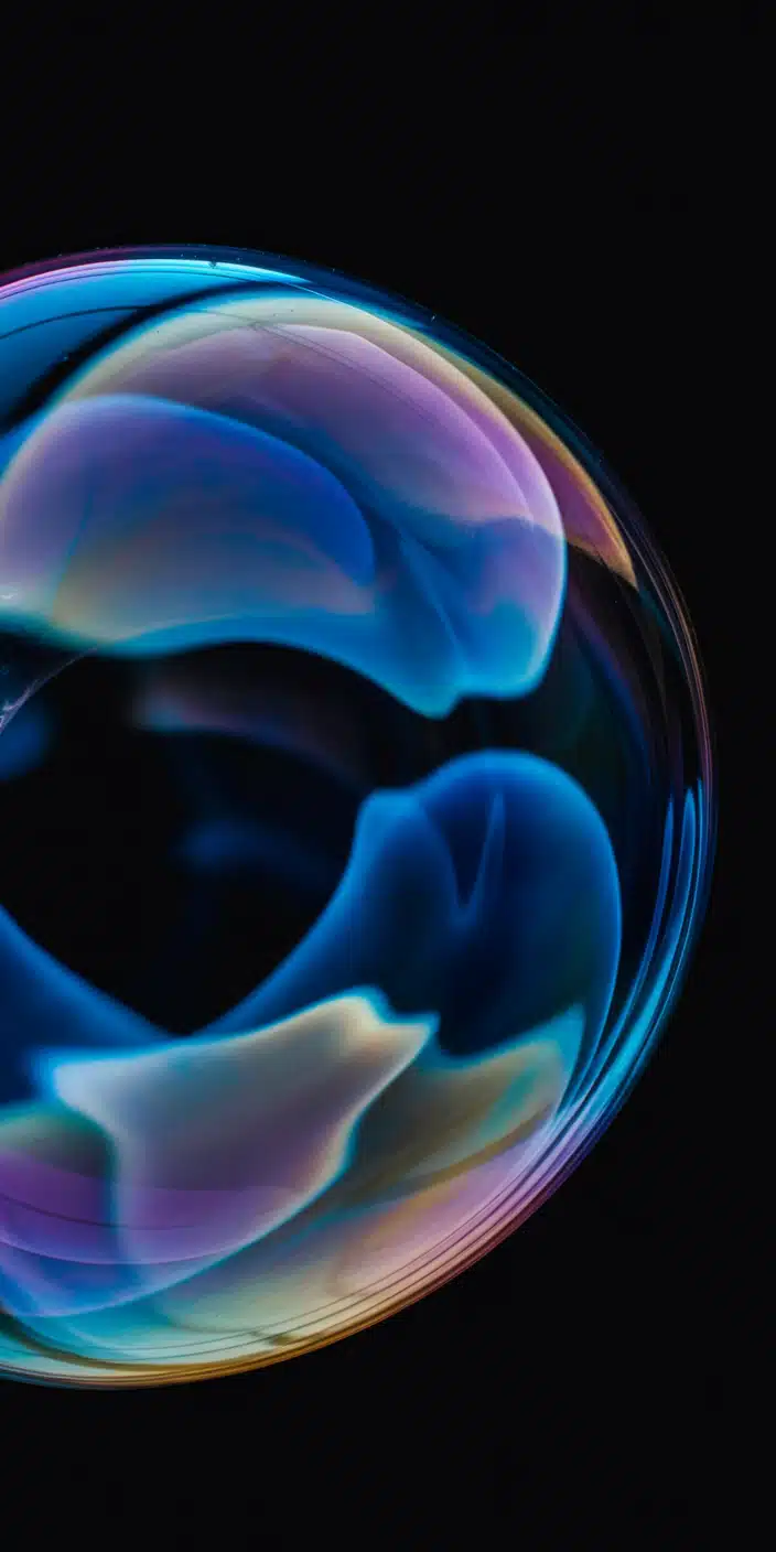 This captivating wallpaper features an abstract planet enveloped in swirling shades of deep blue, aqua, and violet, floating against a pitch-black sky. The blend of cool tones creates a calming, ethereal atmosphere. Perfect for those who love planet wallpaper iphone and appreciate space blue and purple designs, it brings a serene, otherworldly feel to your screen. Ideal for someone seeking peaceful cosmic imagery.